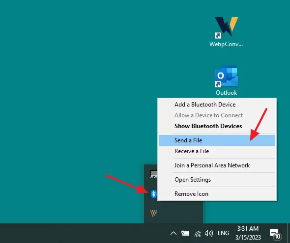 Click on the Bluetooth Icon located at the bottom-right corner of the Windows Taskbar. Click on the Send a File.