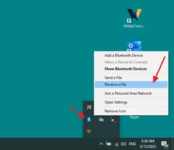 Click on the Bluetooth Icon located at the bottom-right corner of the Windows Taskbar. Click on the Receive a File.