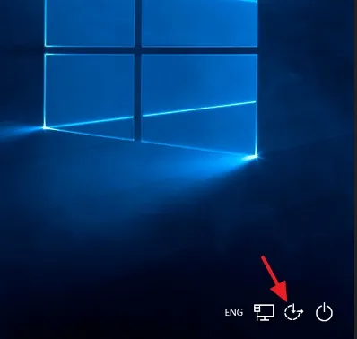 Lock the screen by pressing the Windows Key + L. Click on Ease of access button.